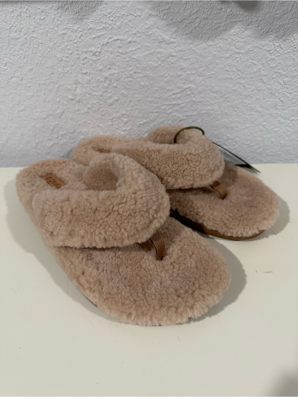 OluKai Kipe’a Heu Shearling Slippers